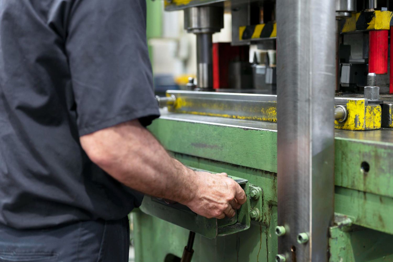 Someone working on a press